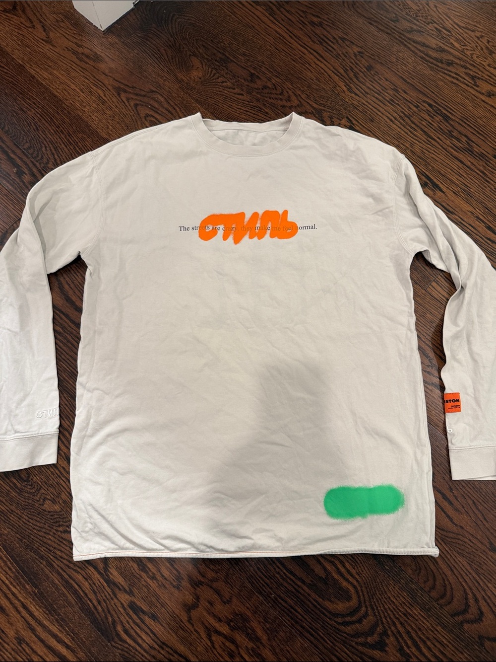 White Long-Sleeve Graphic Shirt with Orange and Green Accents